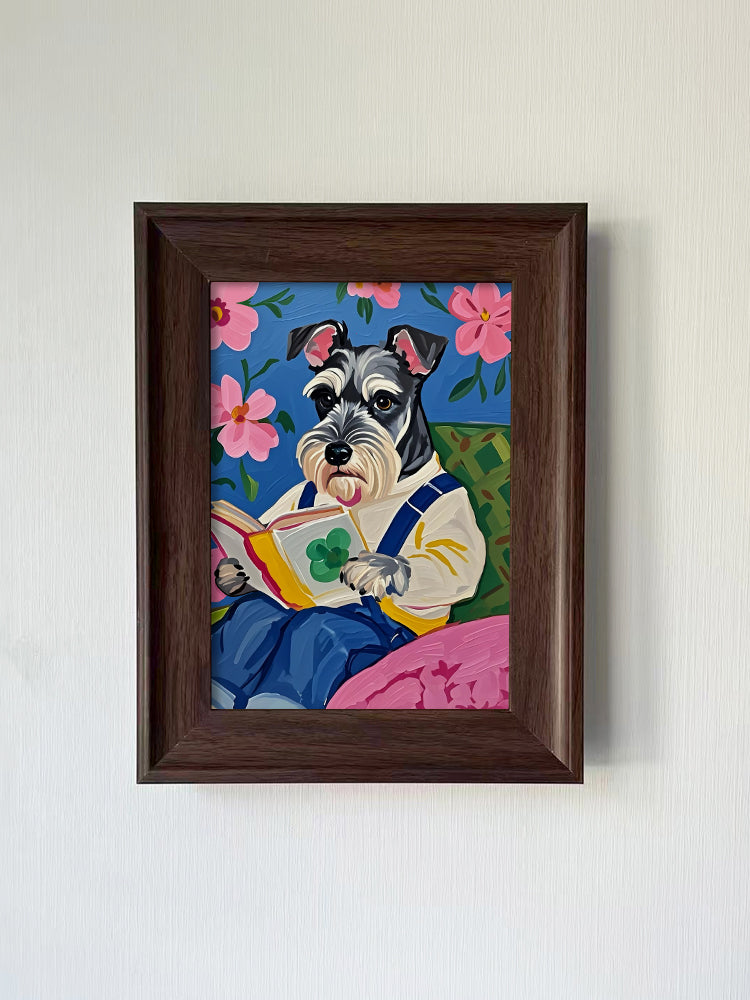 Schnauzer reading a book